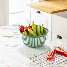 Load image into Gallery viewer, Bowls - Multi Purpose Linea Round Mixing Bowl - ( 3000 ml ) filled with green and red peppers on a kitchen countertop.

