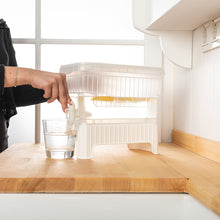 تحميل الصورة في عارض المعرض، 1 Pcs Beverage Dispenser with Dual-Use Stand - Plastic Food Container For Detox and Juice 4.5 Liters in use on countertop.
