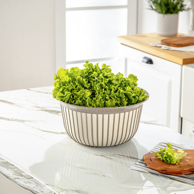 Bowls - Multi Purpose Linea Round Mixing Bowl - ( 5000 ml ) with fresh lettuce on a marble kitchen countertop.