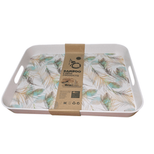Load image into Gallery viewer, A rectangular white serving tray with a floral pattern, featuring edges and handles for grip. There is a label on the tray with product information.
