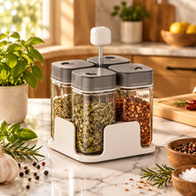 Load image into Gallery viewer, Shakers - Glass Spice seasoning jars Set of 4 with Plastic Lids &amp; Holder displayed in a compact holder.
