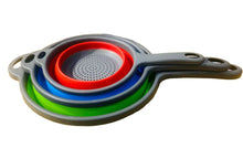 تحميل الصورة في عارض المعرض، Collapsible colander with red, blue, and green sections on a white background
