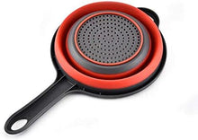 تحميل الصورة في عارض المعرض، Collapsible frying pan with red exterior and black interior on a white background
