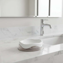 Load image into Gallery viewer, White sink with a silver faucet in a modern bathroom setting
