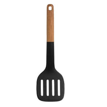 تحميل الصورة في عارض المعرض، Black slotted spatula with a wooden handle on a white background
