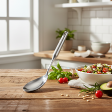 تحميل الصورة في عارض المعرض، A single stainless steel spoon with a long handle, isolated on a white background.
