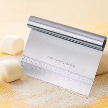 Load image into Gallery viewer, Roll of aluminum foil with a ruler on top, placed on a surface with dough and flour.
