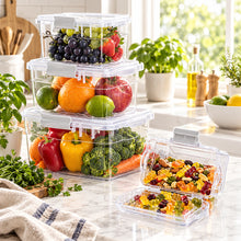 تحميل الصورة في عارض المعرض، A set of clear plastic food storage containers with gray lids, shown stacked and open with fruit, pomegranates, and gummy candies inside on a white background.
