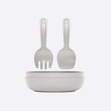 Load image into Gallery viewer, White ceramic salad bowl with fork and spoon on a light gray background
