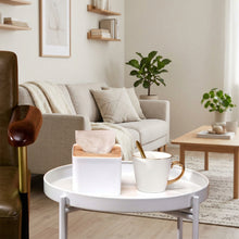 تحميل الصورة في عارض المعرض، Tissue Box - Square Plastic with MDF Cover - Paper Napkin Holder Case on a tray next to a cup.

