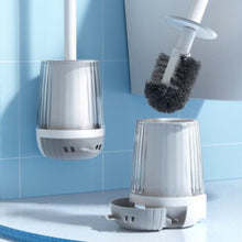 تحميل الصورة في عارض المعرض، Bathroom cleaning brush set with holder on a tiled wall background
