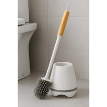 Load image into Gallery viewer, Toilet cleaning brush with wooden handle and white holder in a bathroom setting
