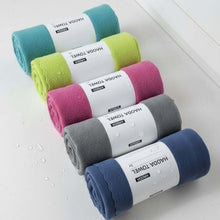 Load image into Gallery viewer, Set of rolled-up towels in various colors with labels on a light background
