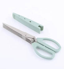 Load image into Gallery viewer, Mint green scissors with a sheath on a white background
