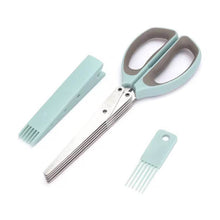 Load image into Gallery viewer, Set of scissors and comb with light blue handles and gray accents on a white background
