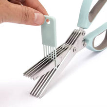 Load image into Gallery viewer, Scissors with a metal cleaning brush attachment on a white background
