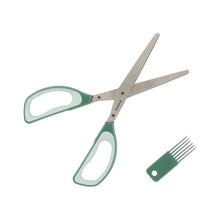 Load image into Gallery viewer, Green-handled scissors with a small green comb on a white background
