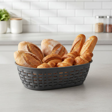 Grey oval multifunctional storage basket made from durable poly-wicker, ideal for organizing and serving.