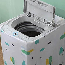 Load image into Gallery viewer, Top-loading washing machine with a colorful pattern on its cover against a green wall.
