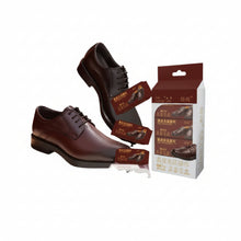 تحميل الصورة في عارض المعرض، Brown leather shoes with shoe care products on a white background
