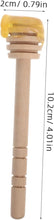 تحميل الصورة في عارض المعرض، A wooden spoon-like utensil with a translucent yellow plastic bowl, shown on a white background with dimension lines and text indicating 2cm/0.79in width and 10.

