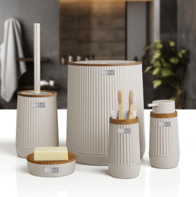 Elegant 5-piece bathroom accessories set in a wooden frame, featuring a waste bin, toilet brush, soap dispensers, and toothbrush holder.