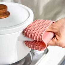 Load image into Gallery viewer, Mini Silicone Oven Mitts Pot Holders - 1 Pc Premium Silicone Tray Grabber in use with non-slip grip and heat resistance.
