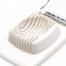 Load image into Gallery viewer, Close-up of a multifunctional square egg slicer with neat slicing mechanism for perfect egg cuts.
