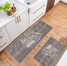 Load image into Gallery viewer, Grey wood-effect kitchen runner and mat in front of white cabinets and a sink
