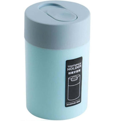 Creative toothpick holder in light blue with sliding lid for easy dispensing and organization.