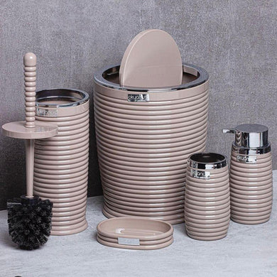 Beige bathroom accessories set with textured design on a gray background