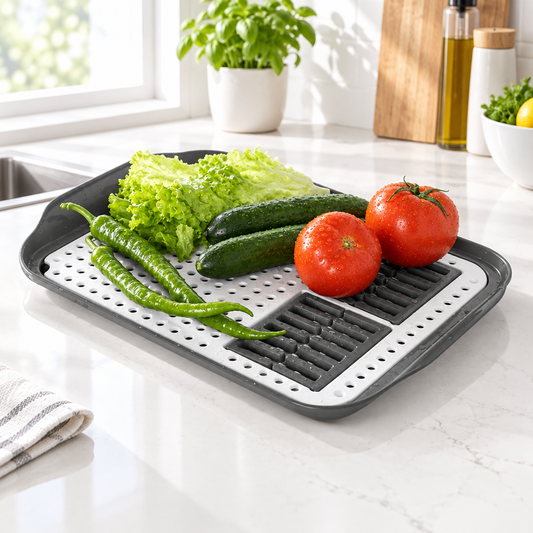 Grey and white draining tray holding vegetables
