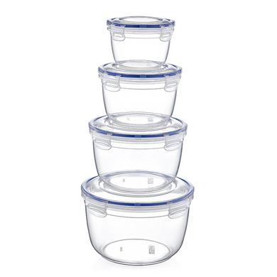 A set of four clear round food storage containers with blue lids, stacked in order of size.
