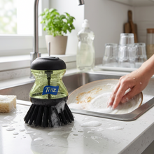 تحميل الصورة في عارض المعرض، A black soap dispensing palm dish brush with non-scratch bristles and a transparent soap container with a blue 'Titiz' logo.
