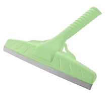 Load image into Gallery viewer, A light green window squeegee with a silicone blade and a plastic handle.
